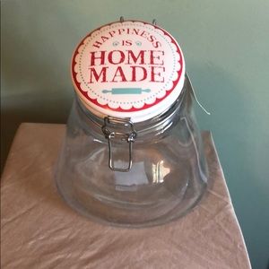 Vintage style glass jar with ceramic lid.